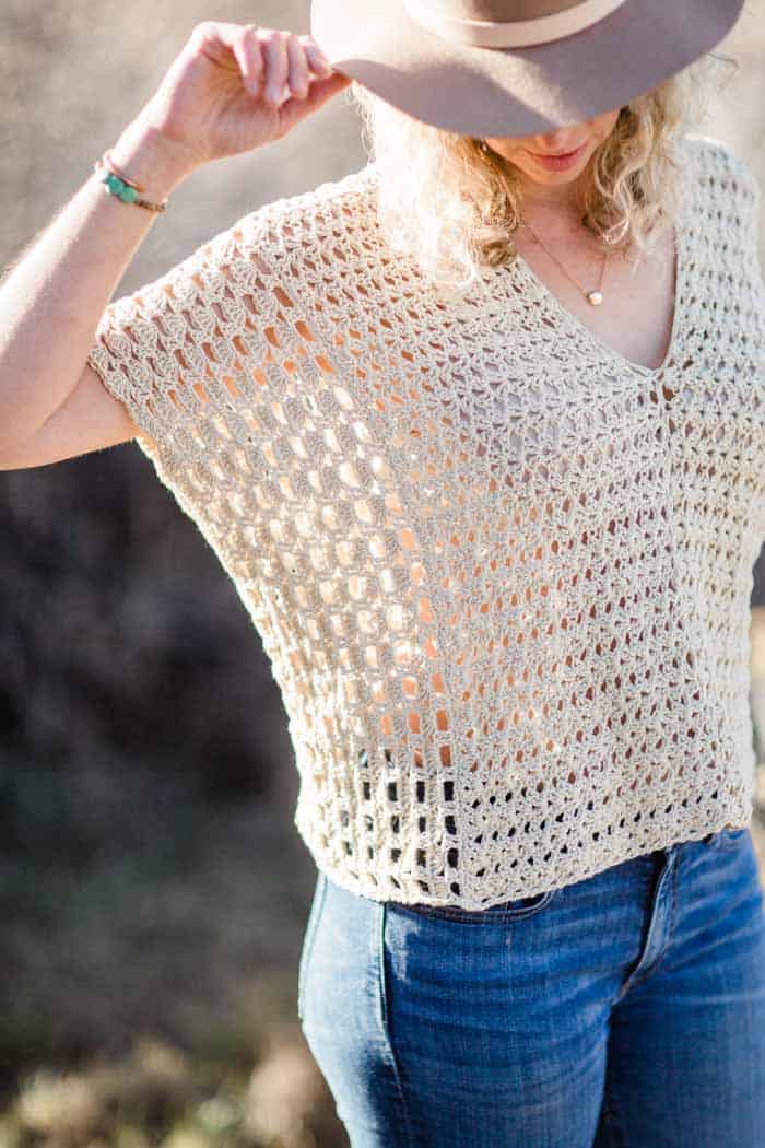 Lacy boho poncho-style crochet top that's perfect for spring or summer. Very simple construction that's easy for beginners. Featuring Lion Brand LB Collection Cotton Bamboo.