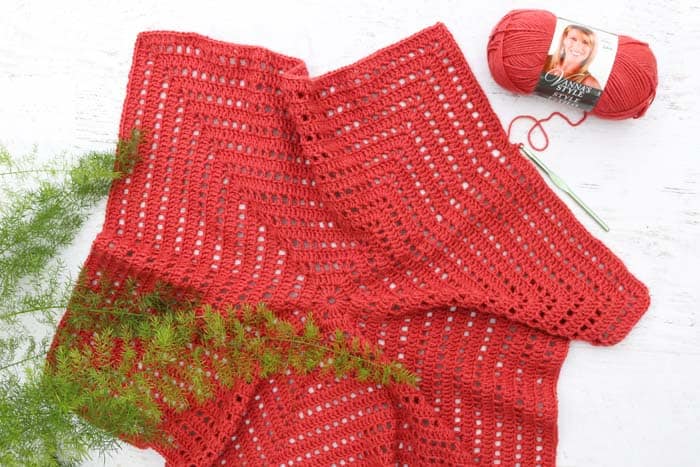 How to crochet a hexagon sweater - step-by-step tutorial featuring Lion Brand Vanna's Style in the color "Tomato."