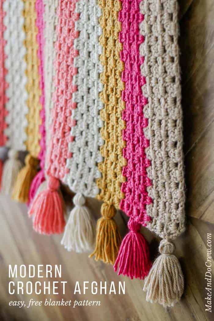 This modern crochet granny stitch blanket free pattern and tutorial is super easy. The tassels make it perfect for a baby nursery or a grown up couch! Made with Lion Brand Heartland yarn (an awesome worsted weight option!)