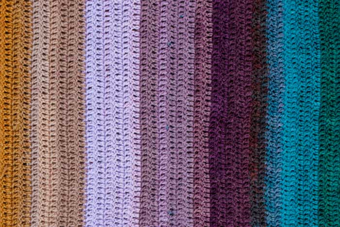 Gorgeous ombre gradient crochet made with remixed Lion Brand Mandala yarn cakes. Video tutorial from Make and Do Crew.