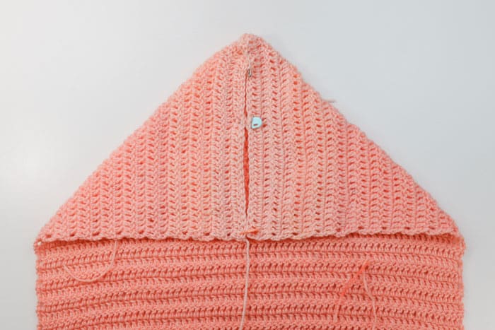 How to seam the hood of a beginner-friendly crochet draped cardigan. 