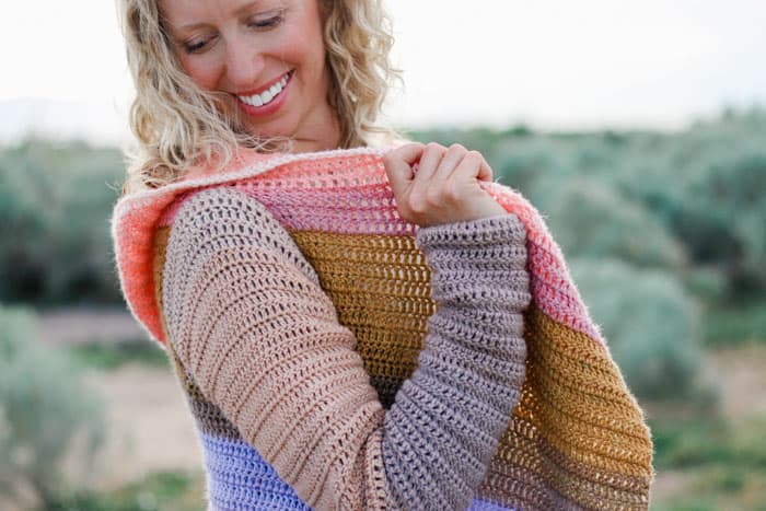 How to crochet a beginner-friendly ombre cardigan with beautiful gradients created with Lion Brand Mandala yarn. 