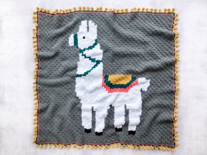 Make this adorable alpaca or llama corner-to-corner crochet blanket using the free graph pattern and video tutorials. This c2c afghan is perfectly sized for a baby blanket or adult throw.