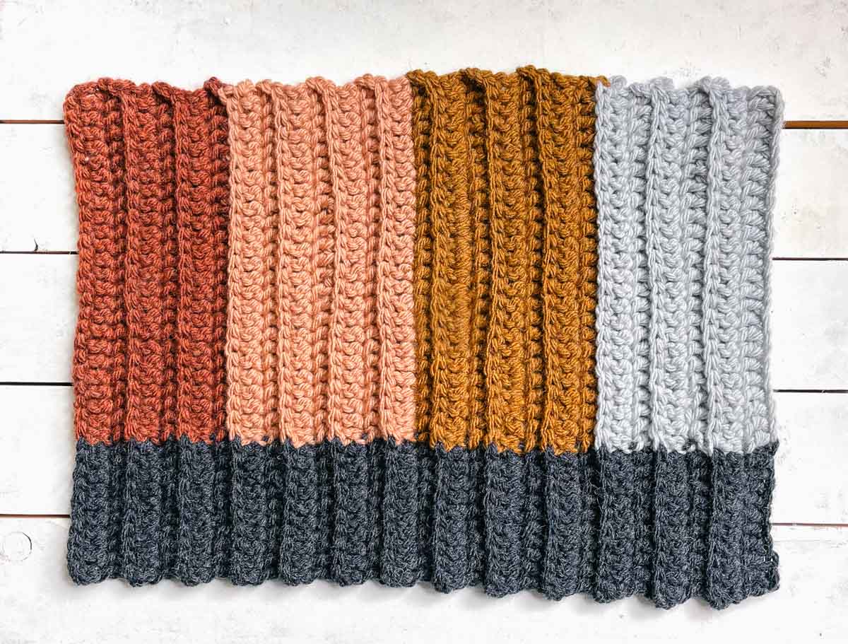 An in-progress scrap yarn crochet hat.
