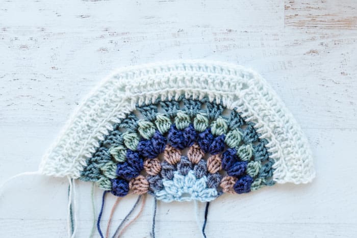 How to crochet a half hexagon for a blanket or afghan. Featuring Lion Brand Mandala Baby in Echo Caves.