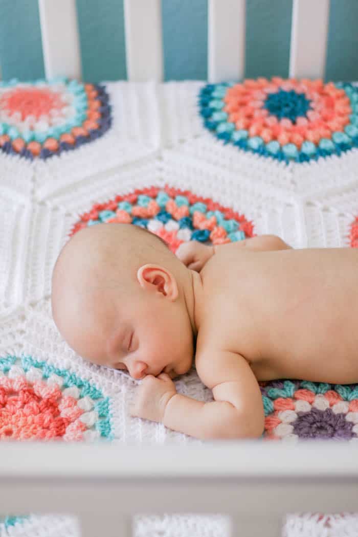 Inspired by vintage quilt patterns, this crochet hexagon baby blanket pattern perfect to make from yarn cakes or yarn scraps. Worked as individual hexagons with the option to join as you go, this portable pattern offers endless possibilities in size and color. Free pattern + video tutorial.