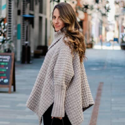 In this crochet poncho video tutorial, learn how to use simple rectangles to construct a cozy crochet poncho sweater with sleeves. These step-by-step instructions are very beginner friendly. Follow along with the free written pattern that includes plus sizes!