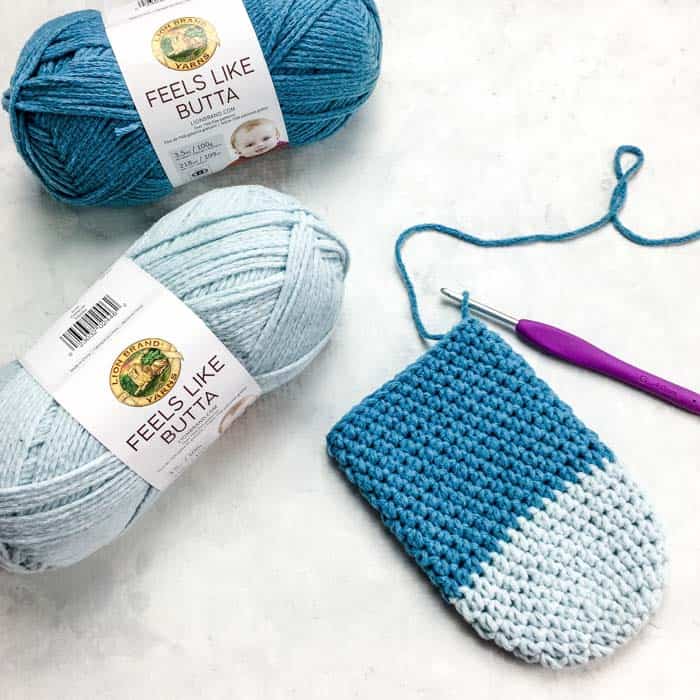 Free easy crochet slipper socks pattern and tutorial featuring Lion Brand Feels Like Butta yarn.