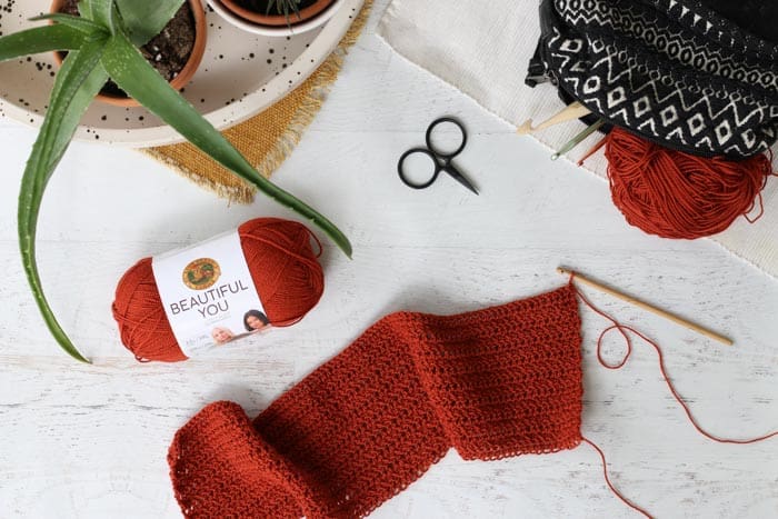 Free crochet dress pattern featuring Lion Brand Beautiful You in Rooibos Tea. 