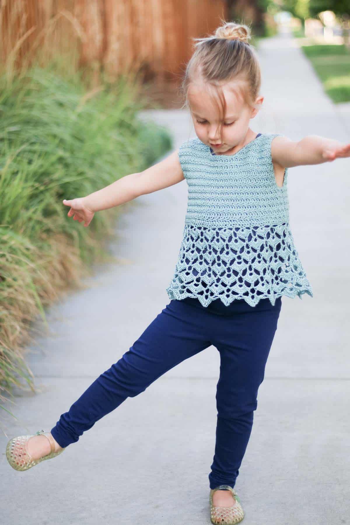 This kids crochet tank top pattern is easy to make into a dress too. Follow the free pattern and video tutorial to learn how!