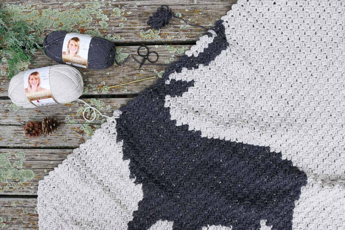 Corner to corner crochet deer blanket pattern using Lion Brand Vanna's Choice yarn. Free pattern + video tutorials.