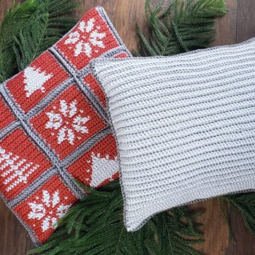 Christmas pillows made of individual crochet squares. Each square has a winter image. These holiday pillows are made by tapestry crochet with Lion Brand Yarn. Free pattern + tutorial.
