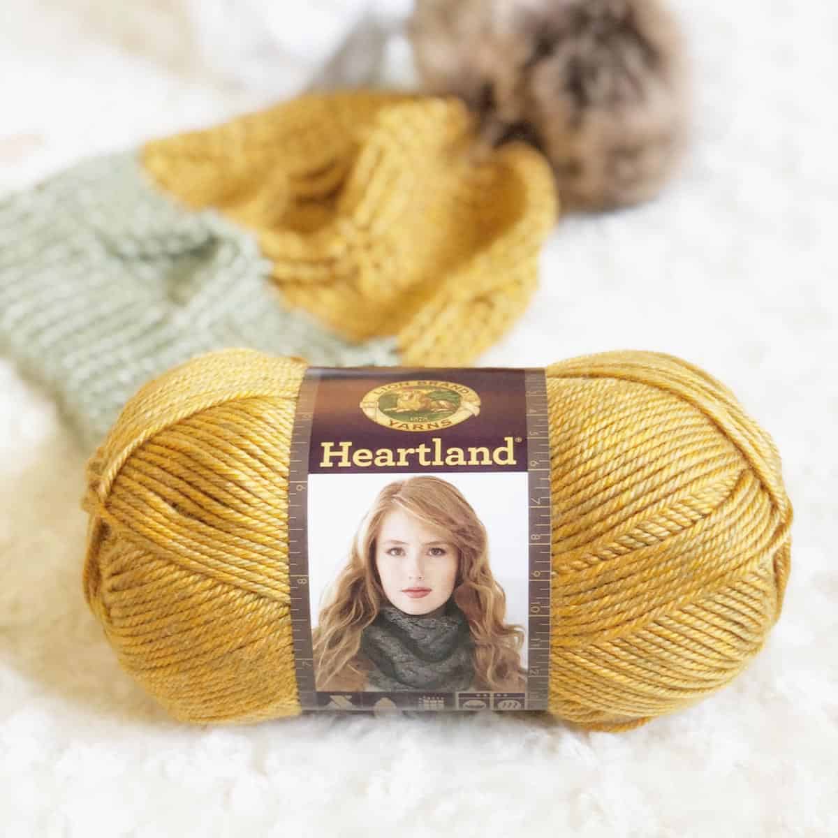 Free crochet cabled hat pattern made with Lion Brand Heartland yarn.