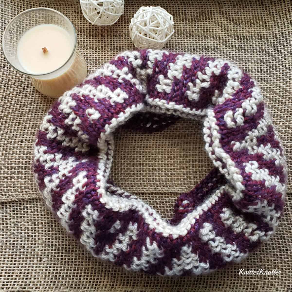 Free crochet pattern for a Tunisian crochet cowl, using basic Tunisian stitches. Made with Lion Brand yarn.