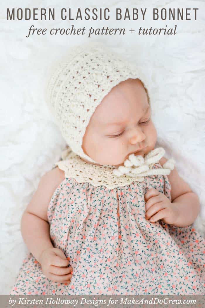 A baby wearing a  white crochet bonnet with ties.