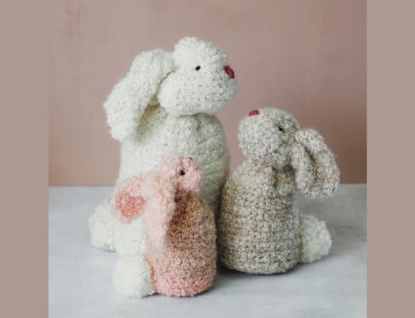 Three realistic crochet bunnies made from rectangles. Made with Lion Brand Homespun Thick & Quick yarn.