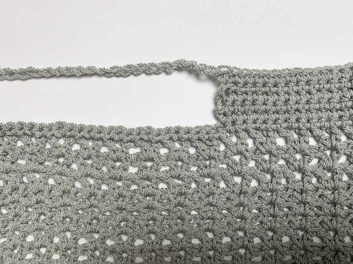How to crochet v-neck portion of this free cropped crochet sweater pattern and tutorial using Lion Brand ZZ twist yarn.