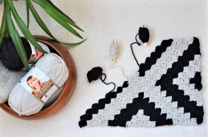 Free crochet pattern and tutorial for a corner to corner crochet pillow using Lion Brand Vanna's Choice yarn. 