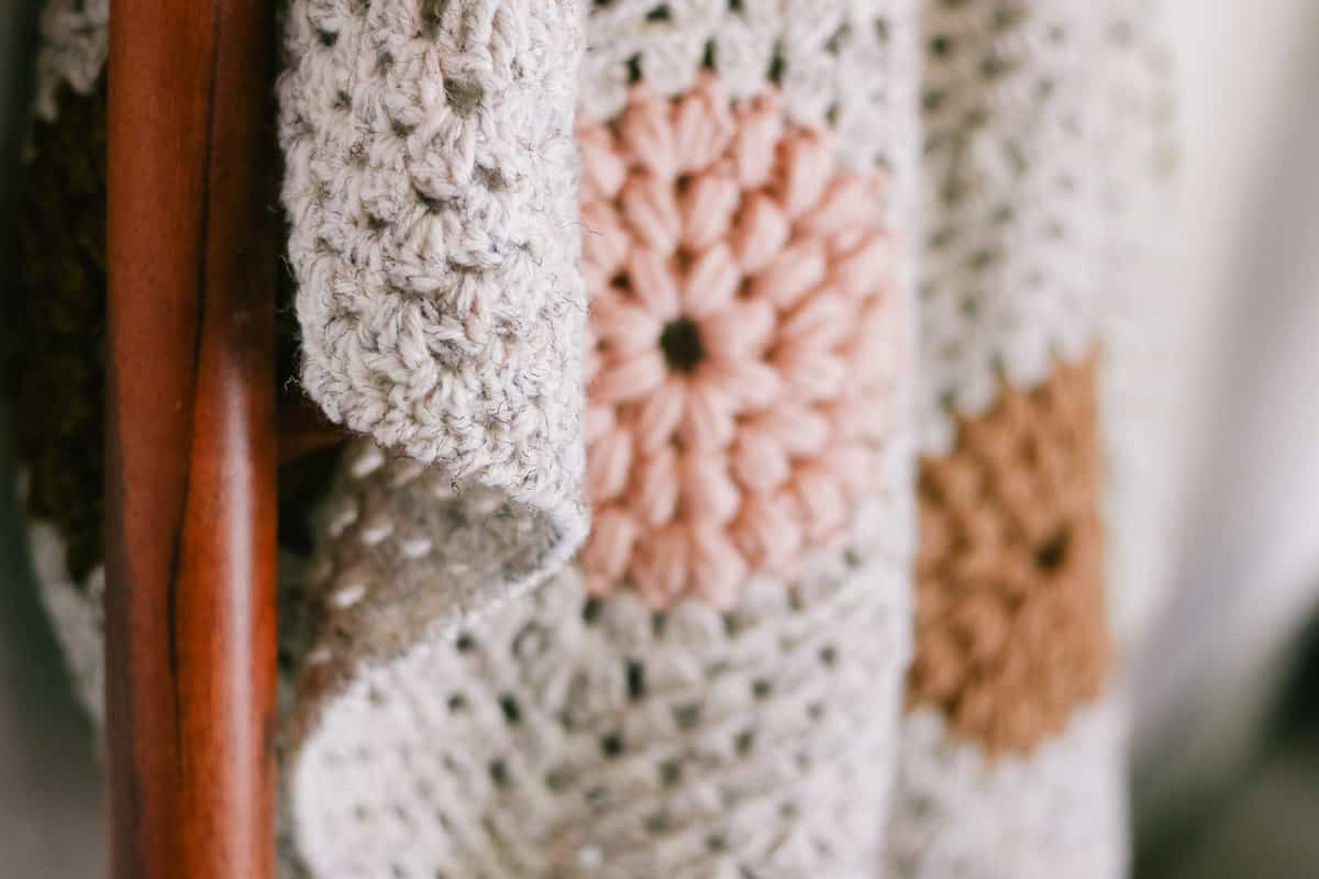 Close up of crochet blanket edging made with the reverse single crochet (crab stitch).