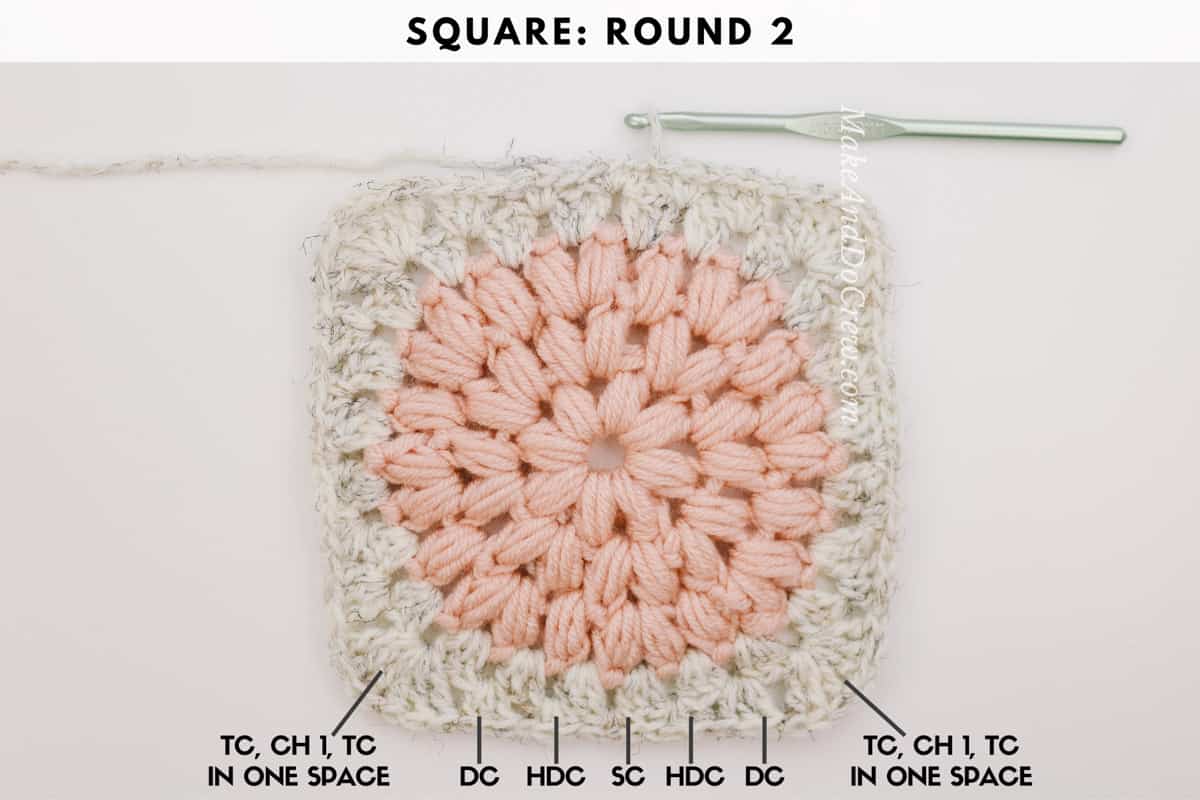 Unique crochet granny square idea: a puff stitch circle surrounded by granny stitches.