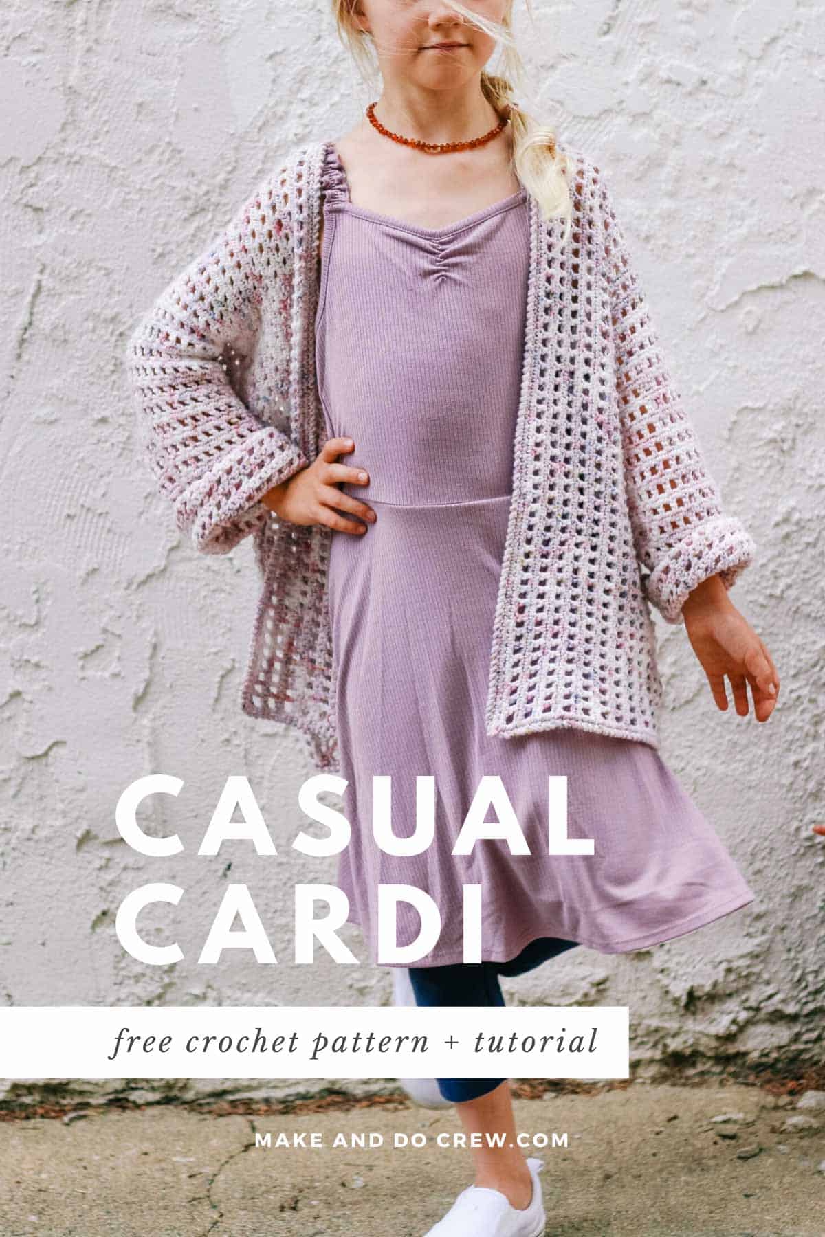 A young girl wearing a casual crochet cardigan made with hand dyed yarn.