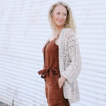 Blonde woman wearing a casual crochet jacket made with the iris stitch and Lion Brand Twisted Cotton Blend yarn.