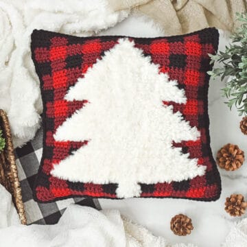 Buffalo plaid crochet Christmas pillow pattern with a faux fur tree. (Color Made Easy + Go For Faux yarn.)