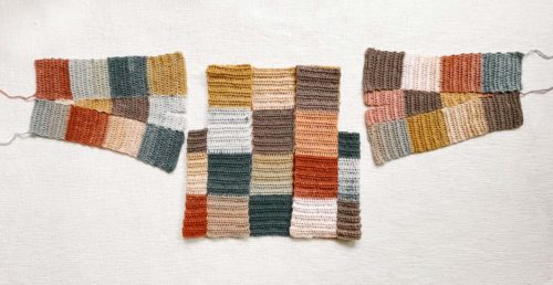 Image of a crochet patchwork cardigan in progress.