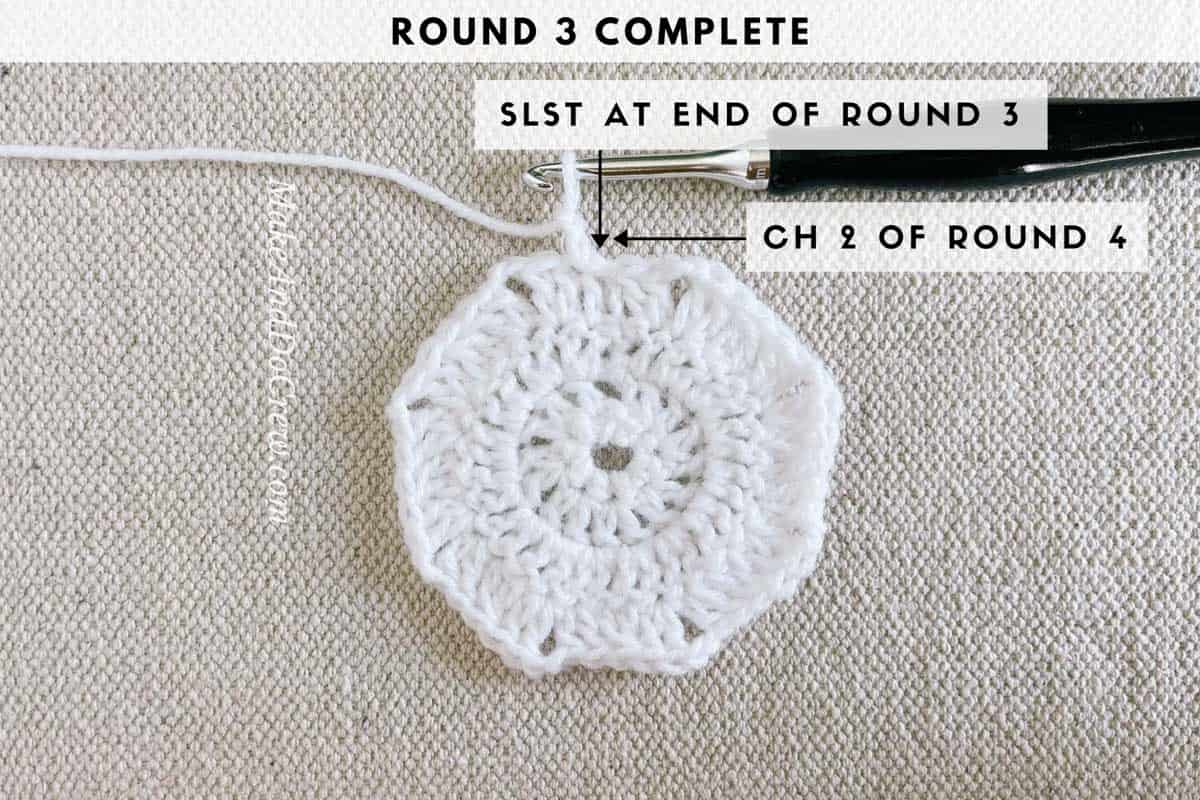 Crochet photo tutorial photo shows the completed round three while crocheting a star.