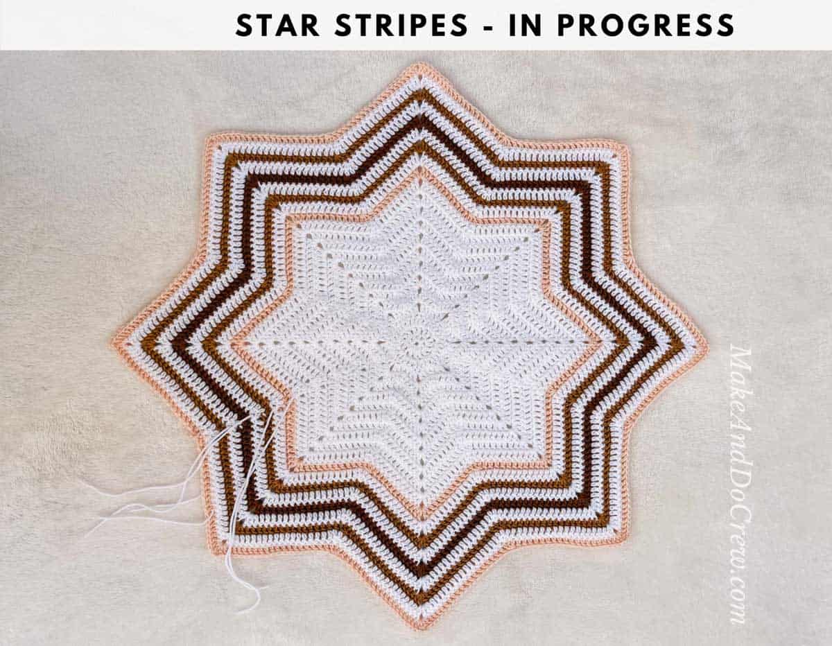 Crochet photo tutorial of an 8 point crochet star with colorful stripes around the edges.
