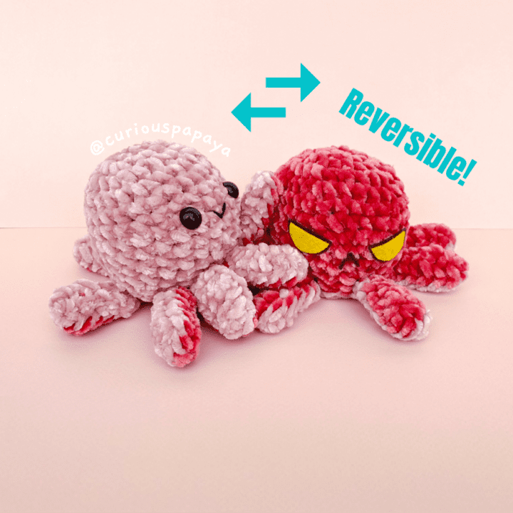 Two reversible crochet octopus amigurumi.