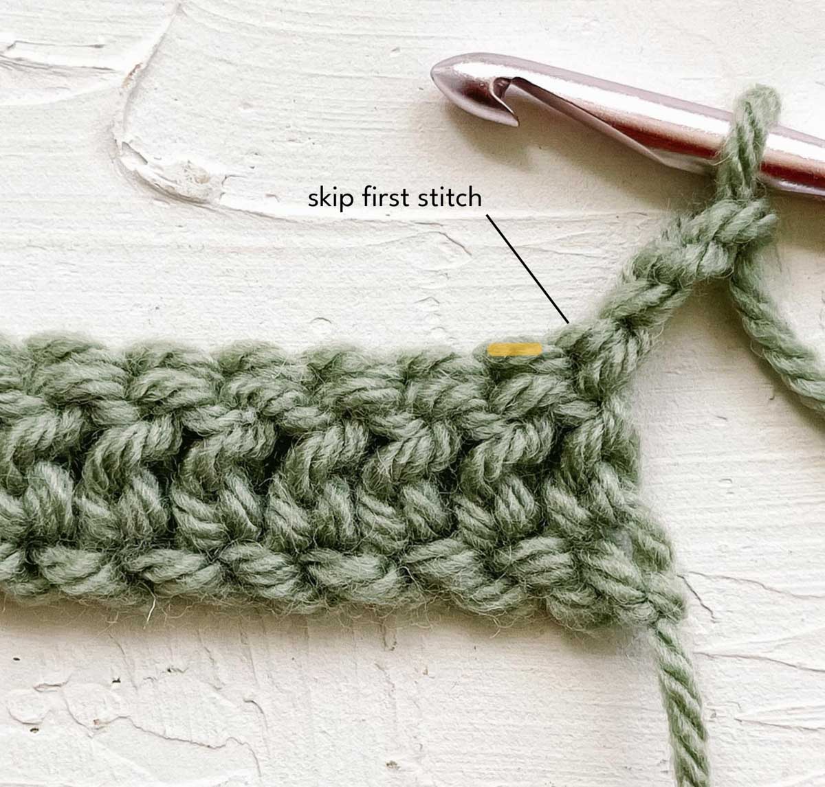 Diagram showing where to start a row of double crochet stitches after the turning chain.