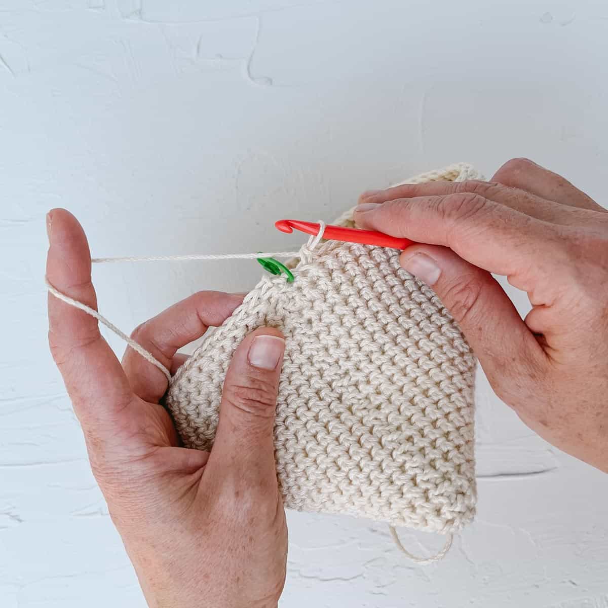 Crochet potholder in progress with thermal stitch.