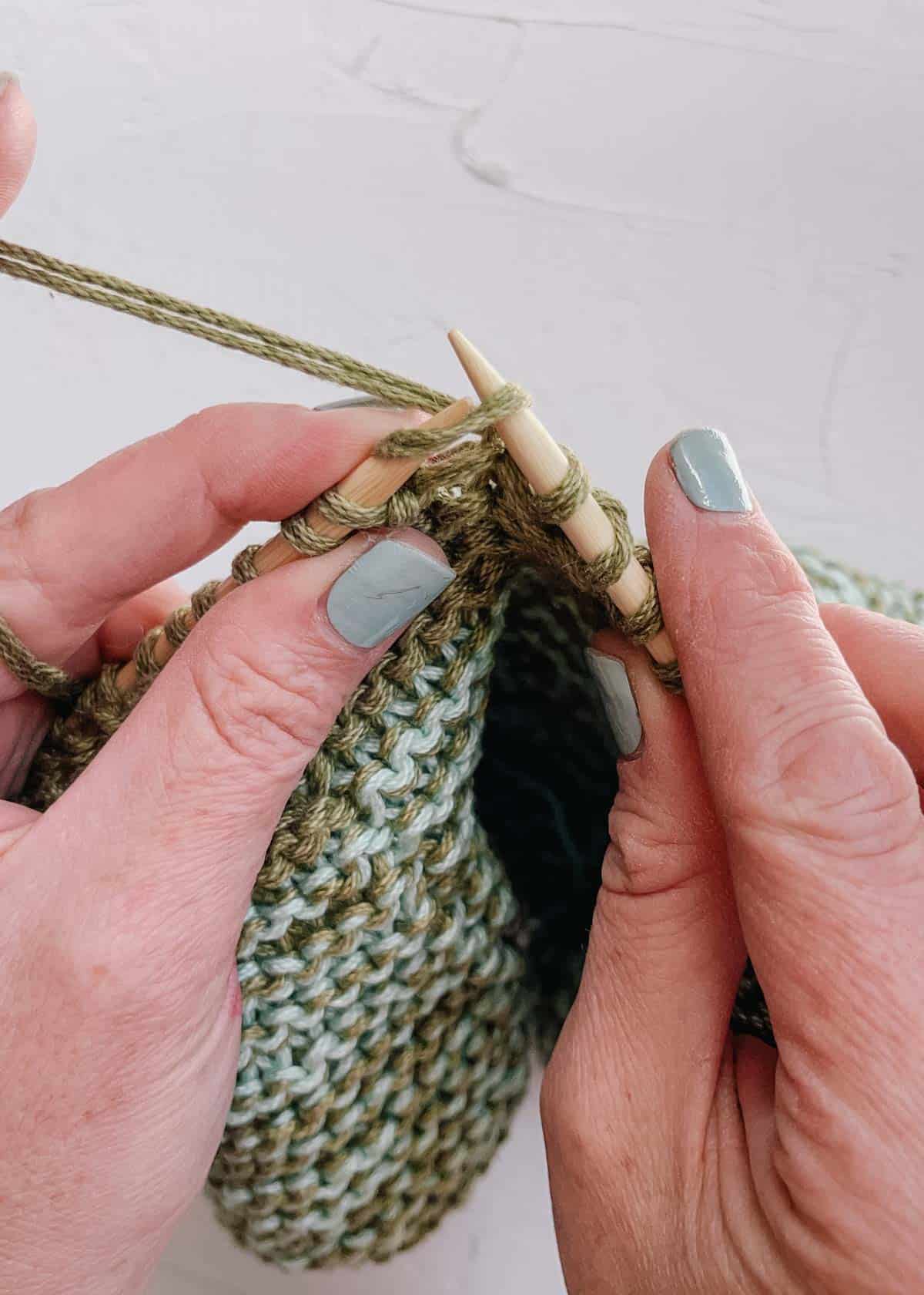 Slipped stitch in knitting.