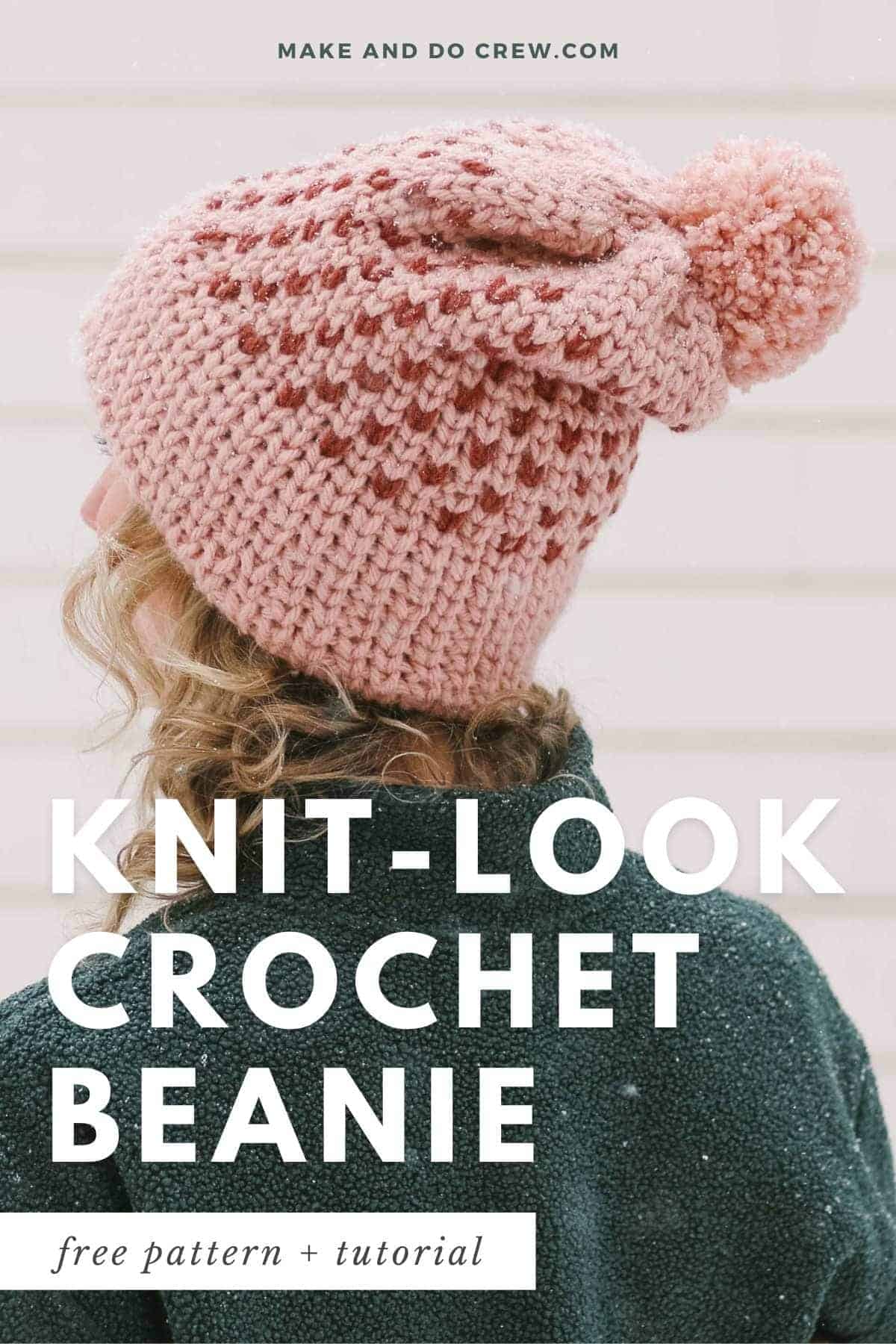 Woman wearing a knit look crochet beanie pattern with small waistcoat stitch hearts on it.