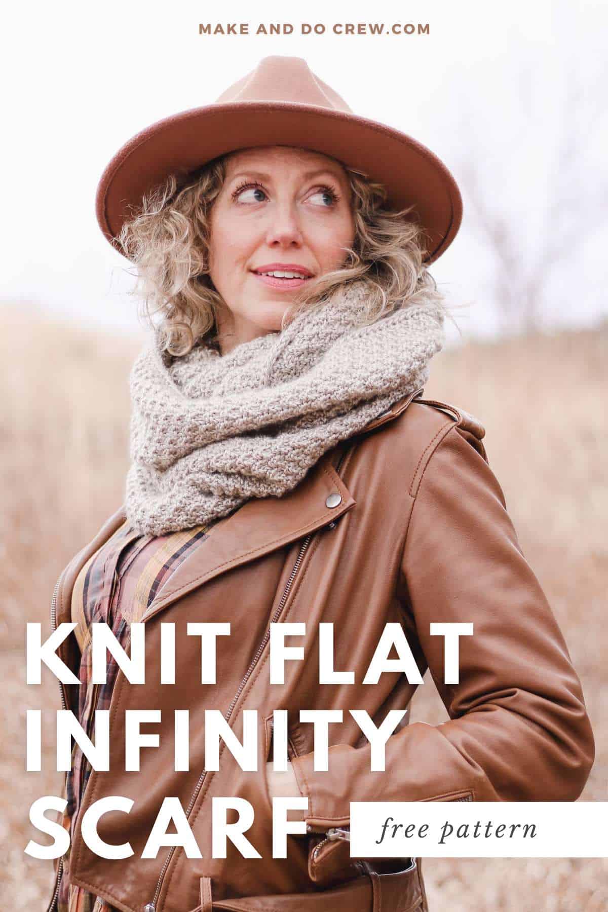 Modern, grey knit infinity scarf worn by a woman looking over her shoulder.