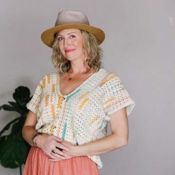 Crochet rectangle top on a blond woman.