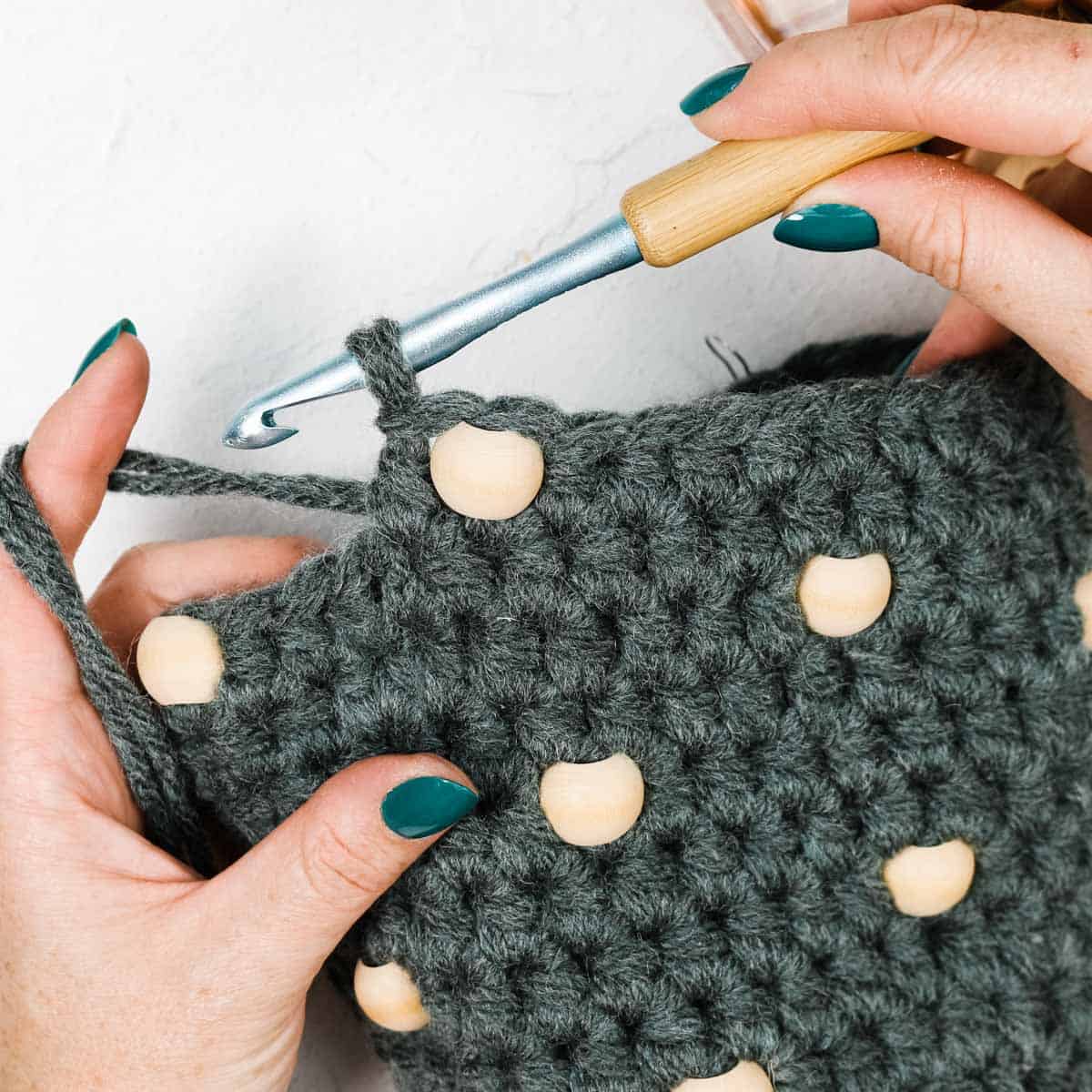 Demonstration of the half double crochet in the next stitch as usual.