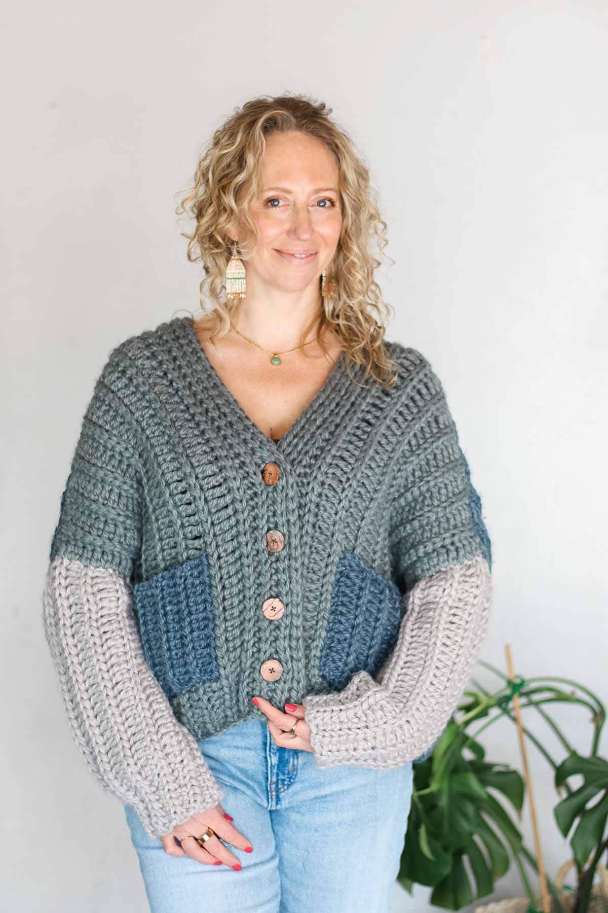 Crochet cardigan that looks knit on a blonde woman.