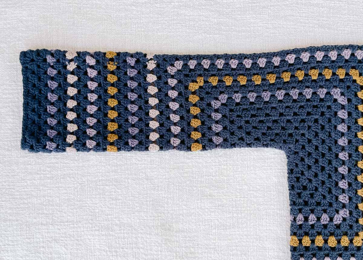 Looser, non-tapered crochet granny stitch sweater sleeve.