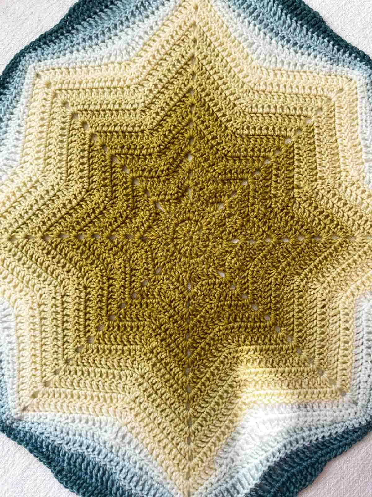 Ombre crochet star in a squared off blanket.