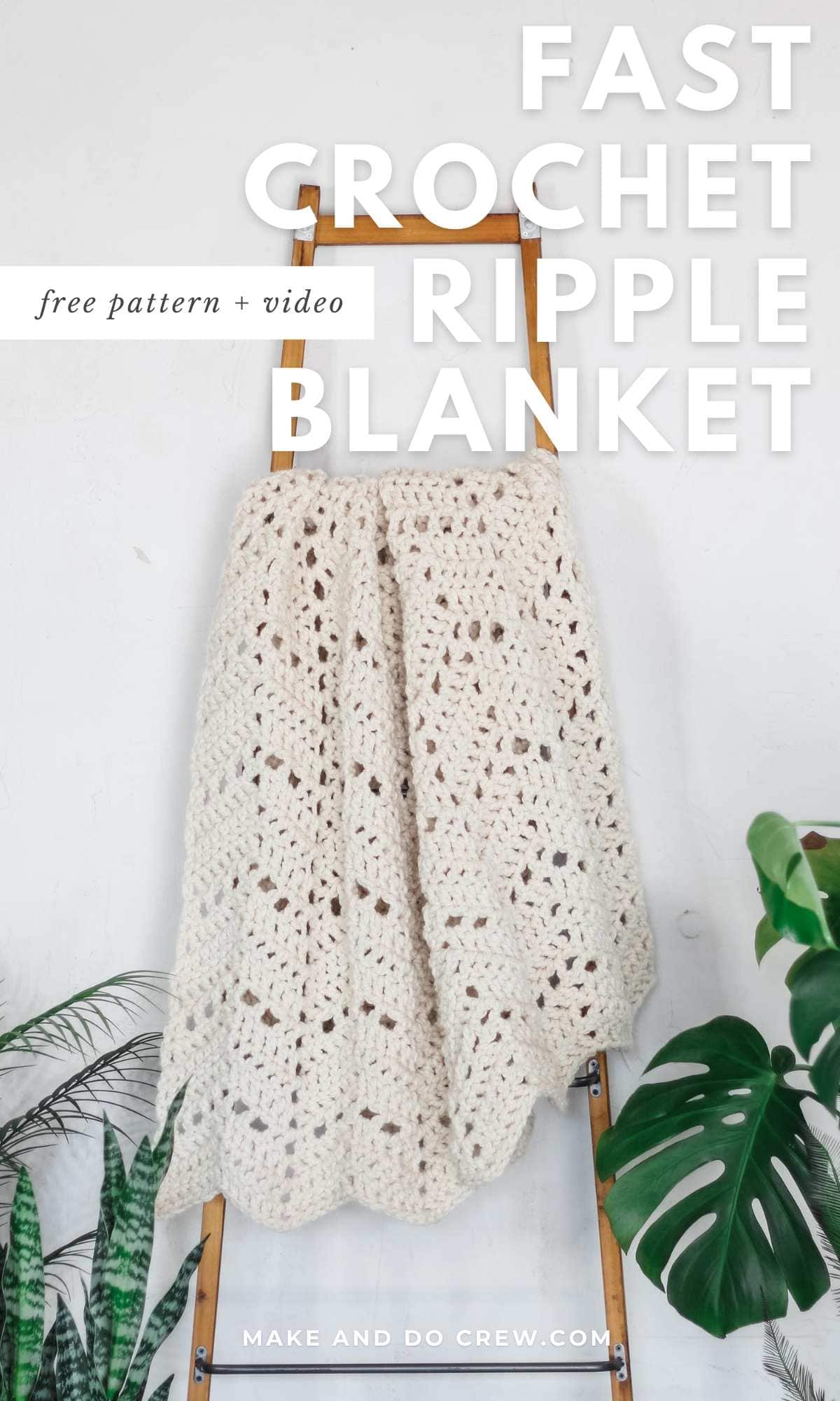 A fast crochet ripple blanket draped on a wooden ladder.