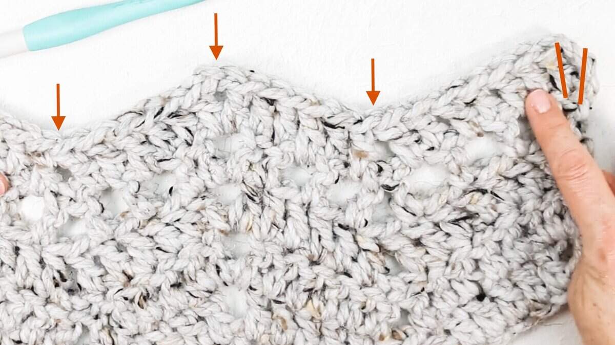 Tutorial showing how to start a row of crochet ripple stitch.