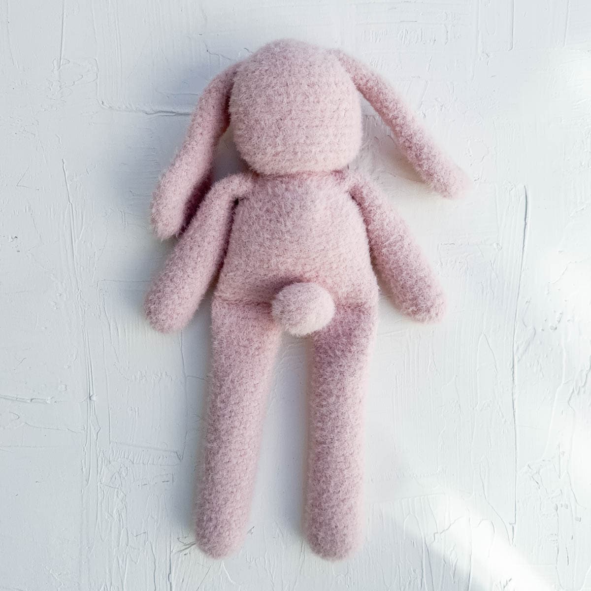 Classic crochet bunny with a crocheted tail.
